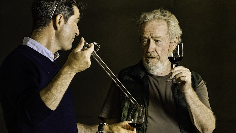 Filmmaker Ridley Scott (right) and Mas des Infermières estate director Christophe Barraud sample wine from barrel.When He's Not Making Blockbuster Films, Ridley Scott Is Making Wine